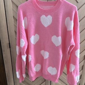 Woman’s heart sweater